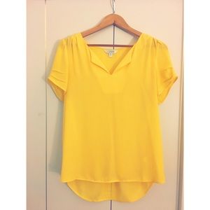 Bright yellow blouse